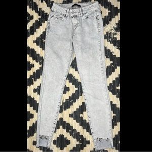 Light acid wash straight leg jeans with studs